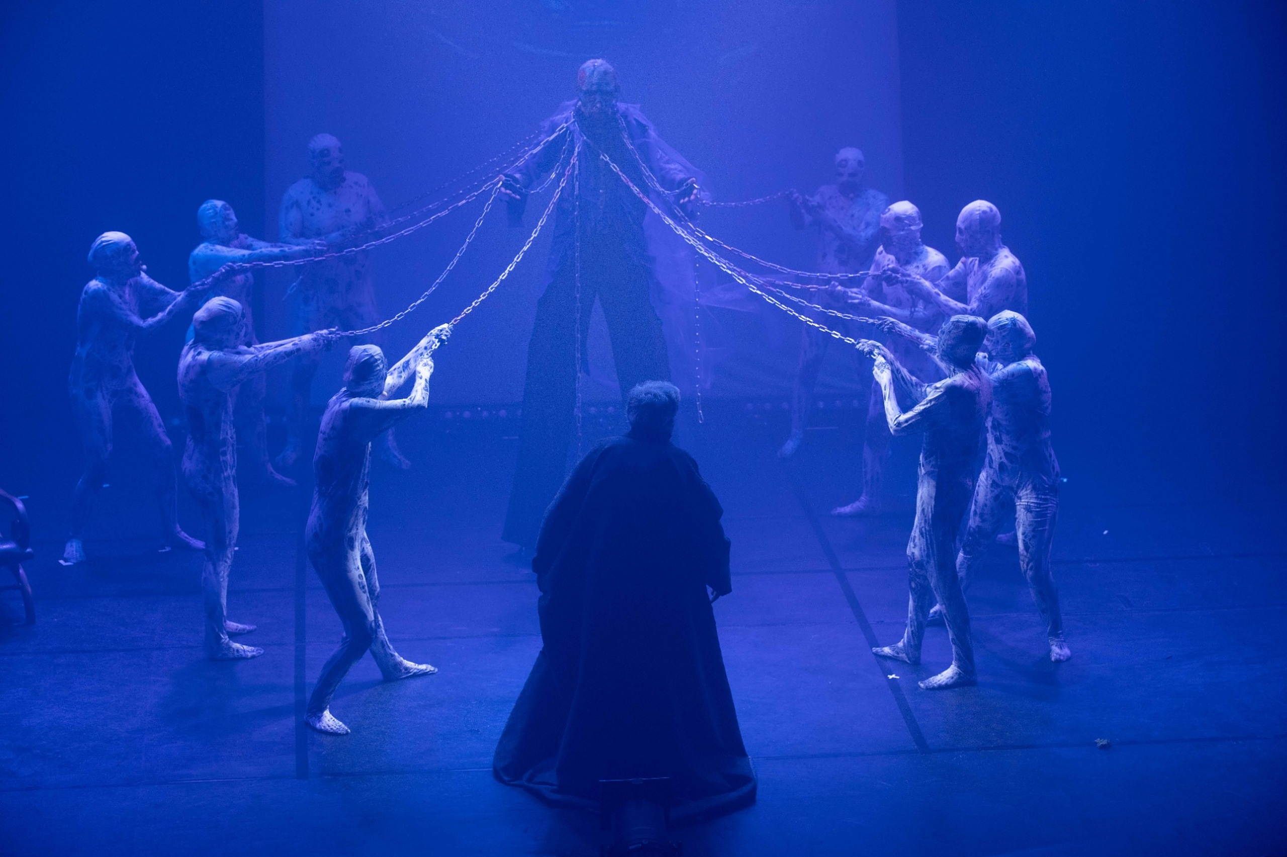 Jacob Marley surrounded by the chains he forged in life